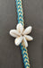 Bracelet fleur coquillages cauris de Tahiti