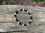 Bracelet élastique de Lithothérapie "Triple Protection" Oeil de tigre, Pierre de Lave et Howlite Blanche