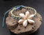 Bracelet fleur coquillages cauris de Tahiti