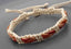 Bracelet réglable unisexe en cuir tressé naturel orange rouge et coton