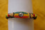 BRACELET RASTA PEACE AND LOVE EN BOIS DE COCOTIER ET CUIR