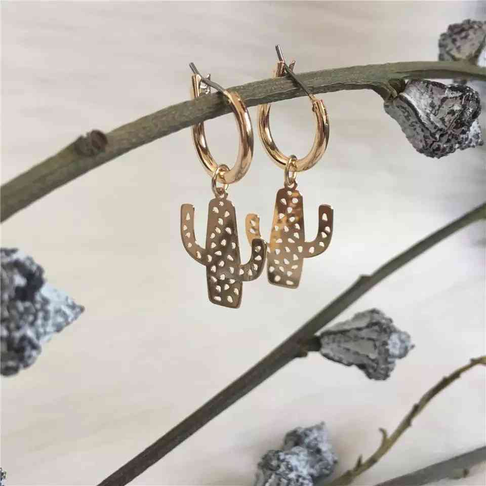 Boucles d'oreilles créoles motif étoile du Nord