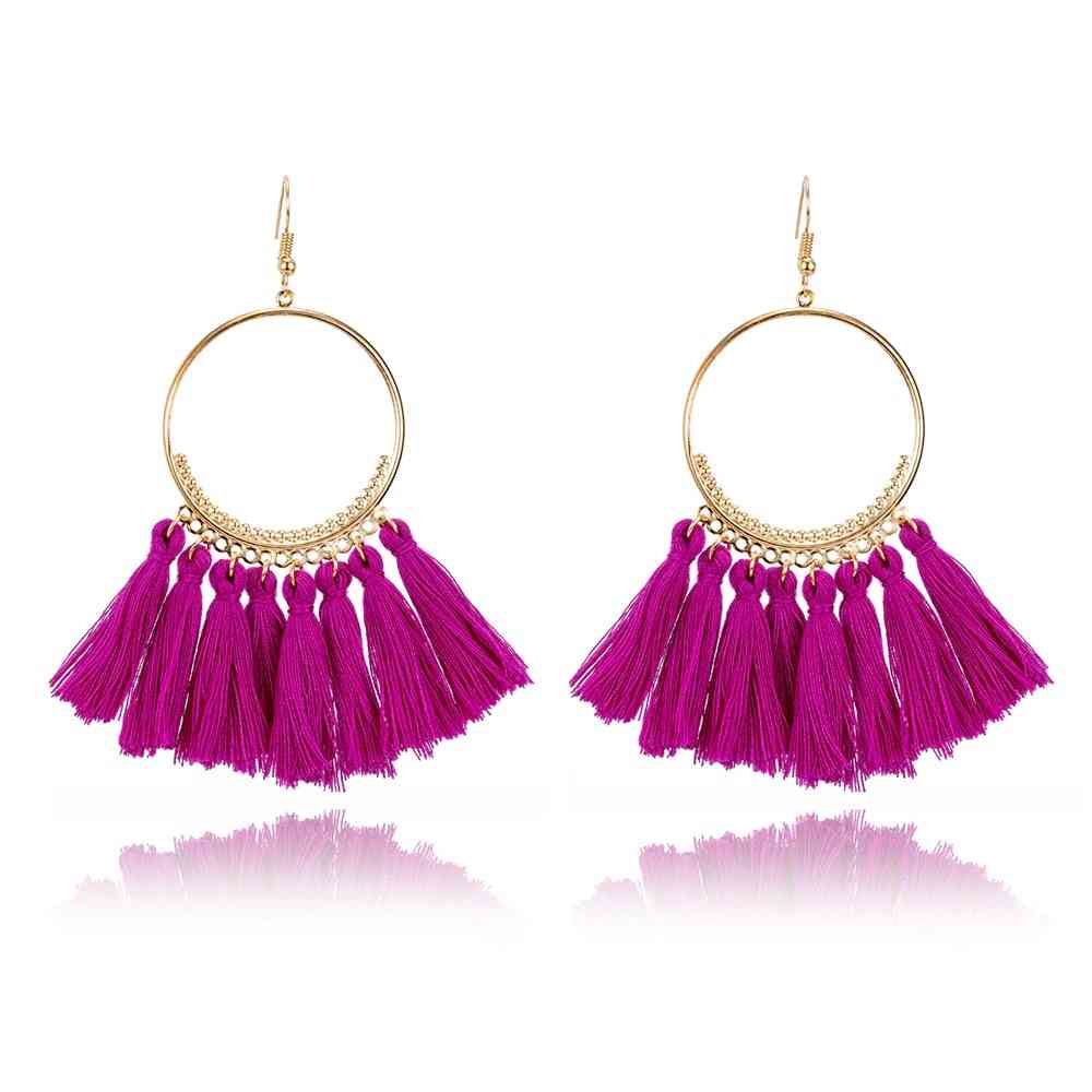 Boucles d'oreilles créoles dorées pompons style bohême chic