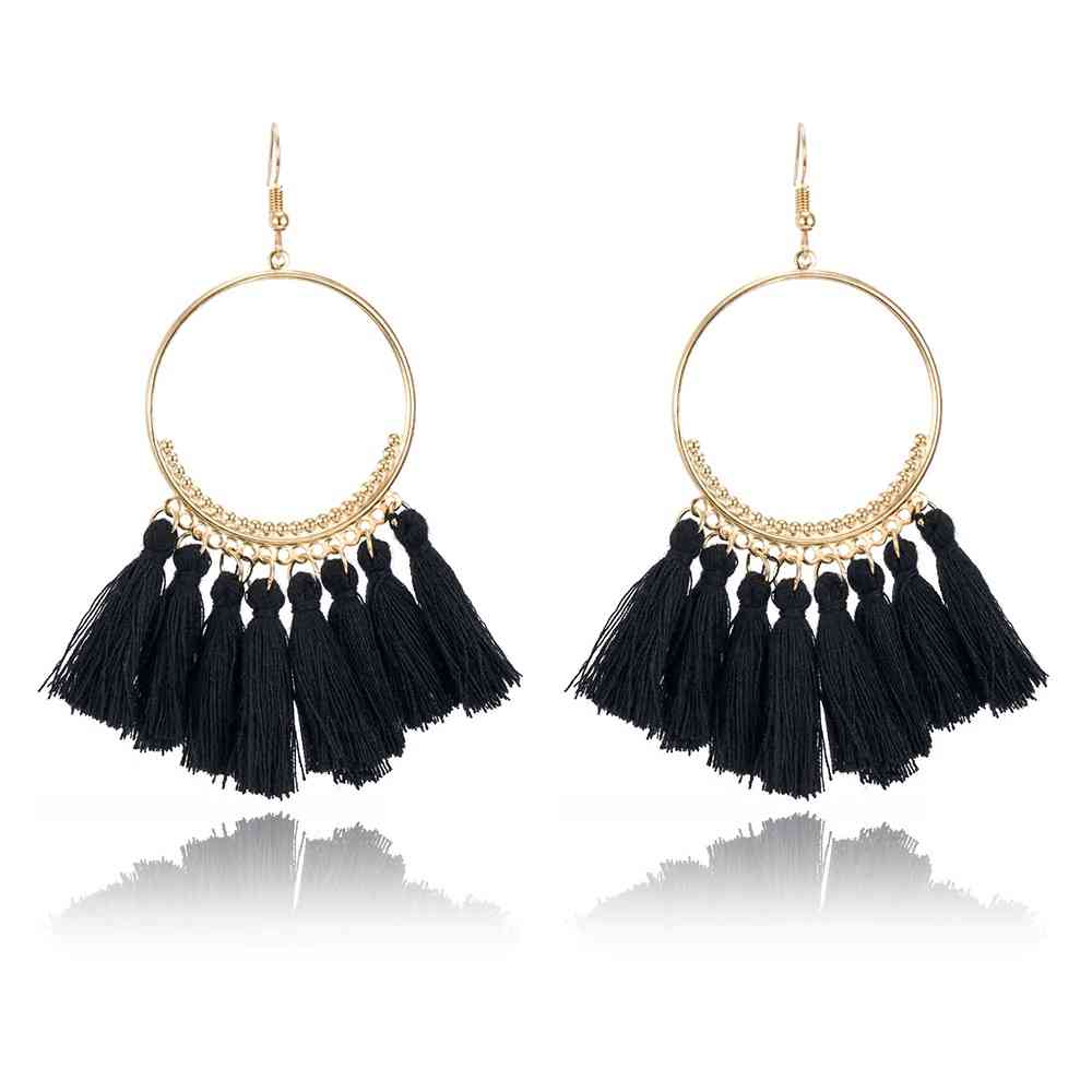 Boucles d'oreilles créoles dorées pompons style bohême chic