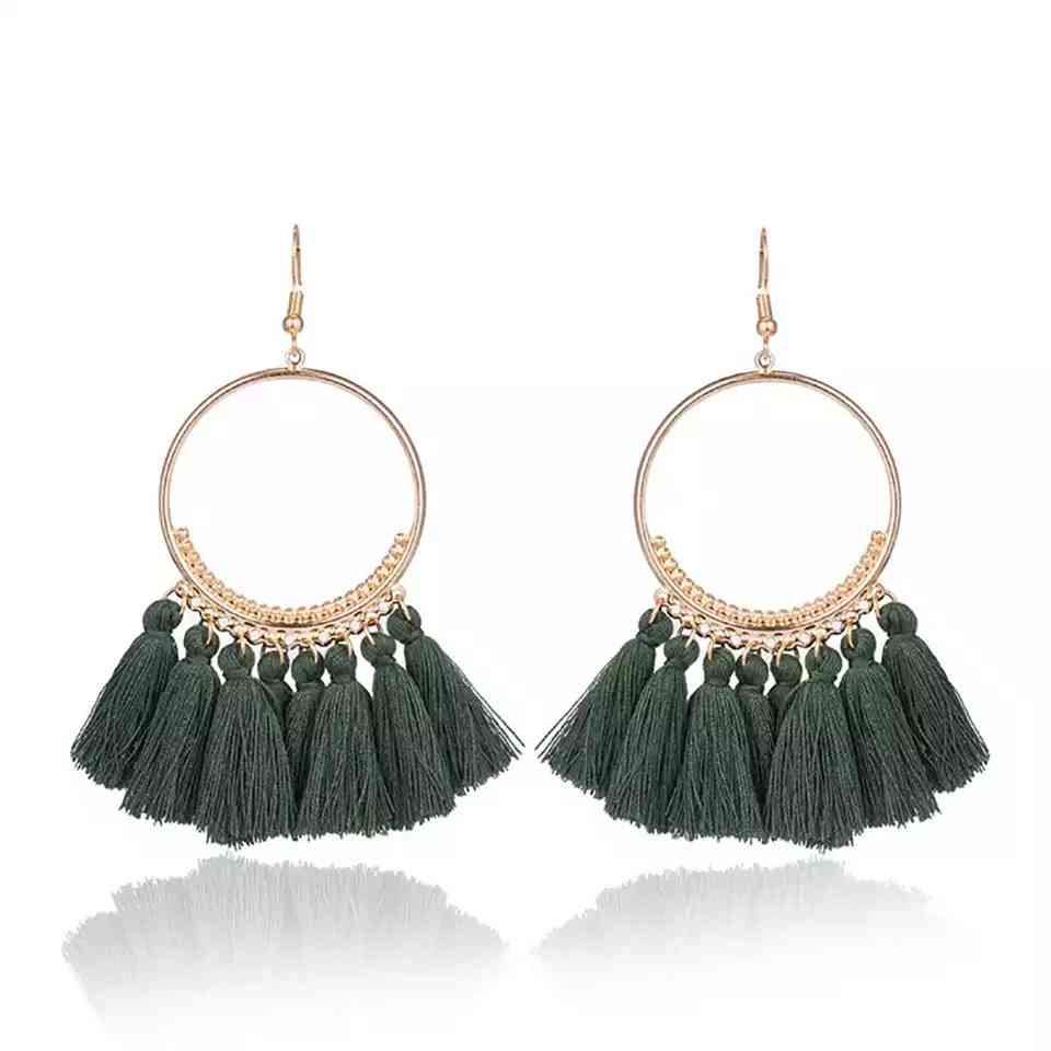 Boucles d'oreilles créoles dorées pompons style bohême chic