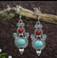 Boucles d'oreilles "Jâtiyâ Âbhûsana" en argent Tibétain et Howlite Turquoise et Rouge - Crochets en argent 925