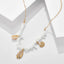 Collier en coquillages cauris et perles en Howlite