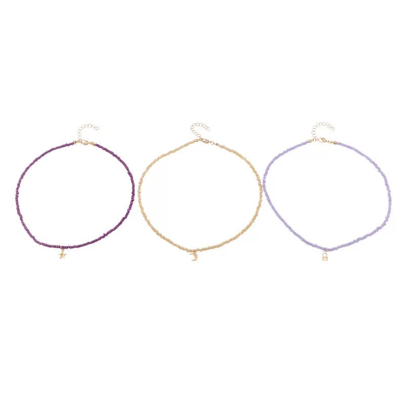 Ensemble de 3 colliers en perles. Violet et or