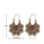 Boucles d'oreilles bohèmes en dentelle dorée modèle Lotus