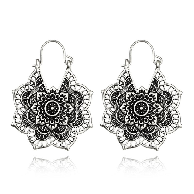 Boucles d'oreilles bohèmes en dentelle d'argent modèle Lotus