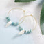 Boucles d'oreilles forme créole en coquillages et Howlite Turquoise