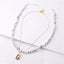 Collier en coquillage Cauri et perles en Howlite blanche