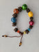 Bracelet ethnique en grains de café et perles multicolores en bois