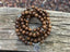 Bracelet Mala Tibétain de méditation 108 perles en bois Wengé et breloque Lotus