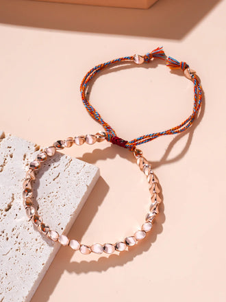 Bracelet de chance en perles de cuivre rose - façon Bouddhisme Tibétain