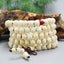 Bracelet Tibétain Mala en perles de bois de santal beige - 8 mm