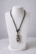 Collier mixte avec pendentif Tiki noir et blanc - bijou maori Hawai