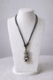 Collier mixte avec pendentif Tiki noir et blanc - bijou maori Hawai