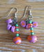 Boucles d'oreilles avec breloques et perles en bois rose et orange