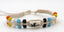  BRACELET EN COTON CIRÉ ET PERLES