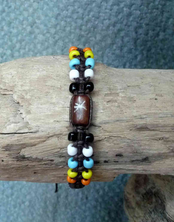  BRACELET EN COTON CIRÉ ET PERLES