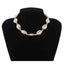 Collier coquillage cauri naturel et or - Tendance et élégant