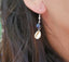 Boucles d'oreilles pendantes en Lapis Lazuli et coquillage Cauri