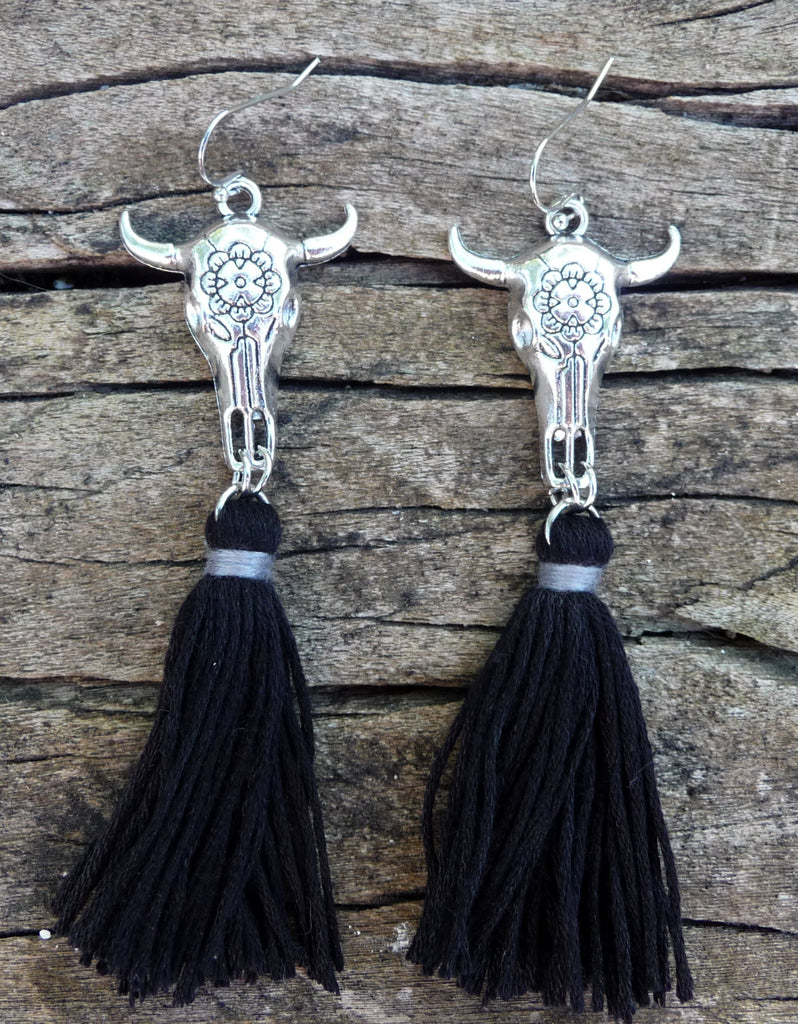 Boucles d'oreilles bohèmes tête de Buffle et pompons