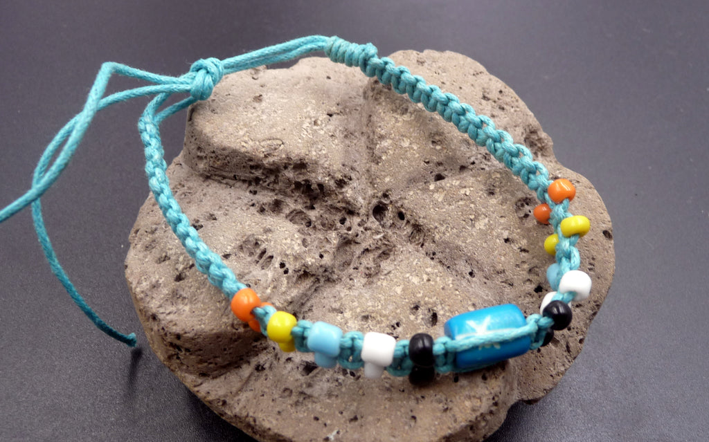 Bracelet ethnique en coton ciré bleu turquoise et os de buffle
