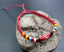 Bracelet ethnique en coton ciré rouge et os de buffle