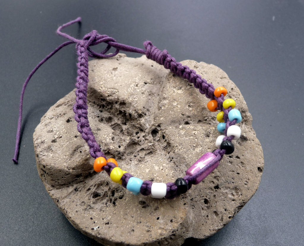 Bracelet ethnique en coton ciré violet et os de buffle