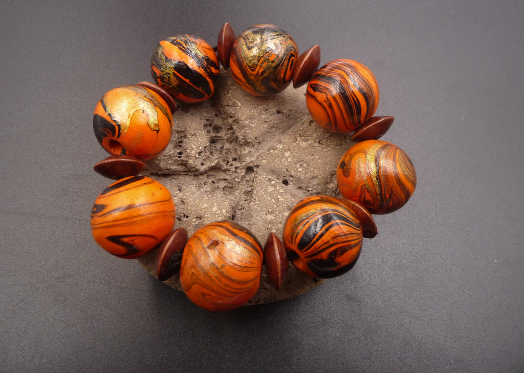 Bracelet en bois de manguier orange