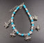 Bracelet Breloques Eléphants et perles turquoises artisanat Thaïlande