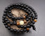 Bracelet Mala tibétain 108 perles "Dragon de Lumière" en Onyx