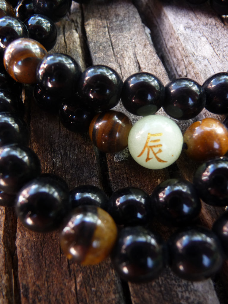 Bracelet Mala tibétain 108 perles "Dragon de Lumière" en Onyx