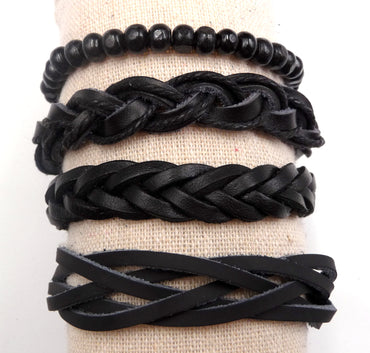 Manchette pour homme. Ensemble de 4 bracelets noirs très tendance