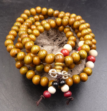 Bracelet Tibétain Mala en perles de bois de santal marron + Breloque Vajra ou Dorjé