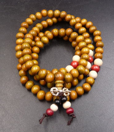 Bracelet Tibétain Mala en perles de bois de santal marron + Breloque Vajra ou Dorjé
