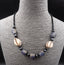 Collier Africain en pâte de verre bleue, perles de verre et coquillage Cauri Porte-Bonheur