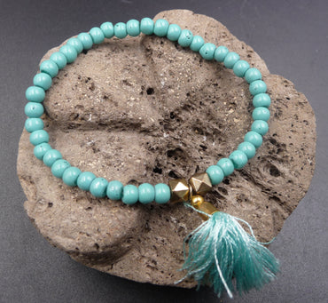 Bracelet Bohème en pierre de howlite turquoise et pompon