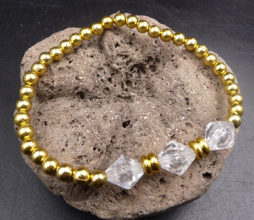 Bracelet perles or et perles toupie cristal soirée fête