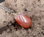 Collier avec pendentif en cornaline