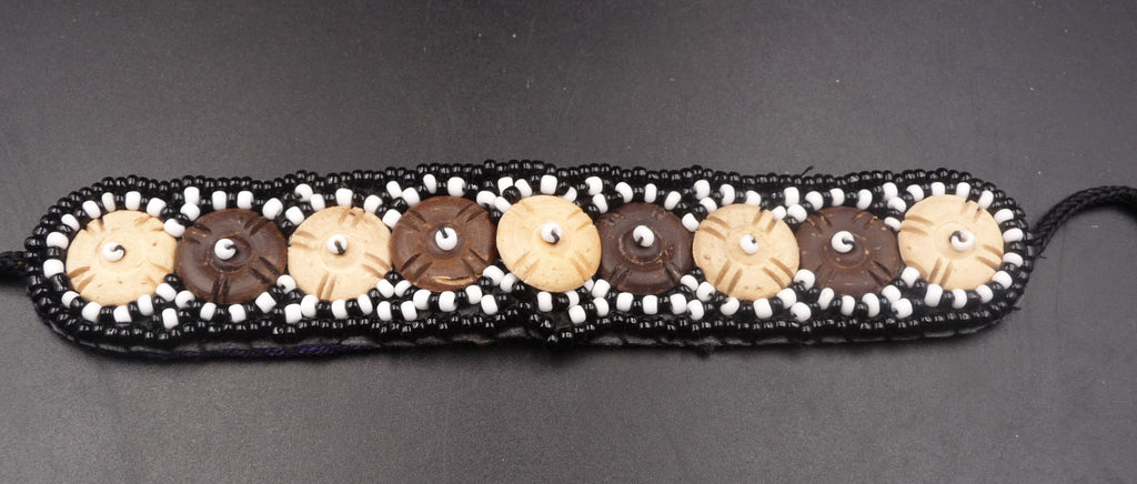 Bracelet en tissu ikat, perles de noix de coco artisanat Bali