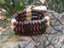 Bracelet mixte triple rang de perles en bois marron,noir et beige