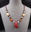 Collier ethnique artisanal en graines naturelles et bois - Trinidad
