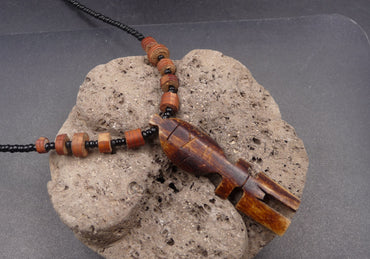 Collier mixte homme / femme avec pendentif Tiki en corne - bijou maori Hawai Tahiti