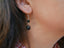 Boucles d'oreilles pendantes 2 boules en Onyx