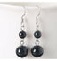 Boucles d'oreilles pendantes 2 boules en Onyx