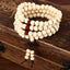 Bracelet Tibétain Mala en perles de bois de santal beige - 6 mm
