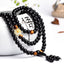 Bracelet Mala tibétain 108 perles "Dragon de Lumière" en Onyx